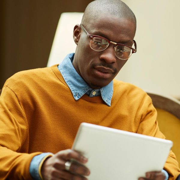 modern-african-man-relaxing-in-cafe-2021-09-24-03-59-54-utc (1) (1)